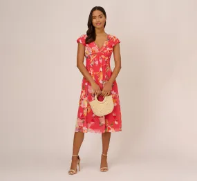 Floral Print Midi Dress With Twist Neckline In Coral Multi