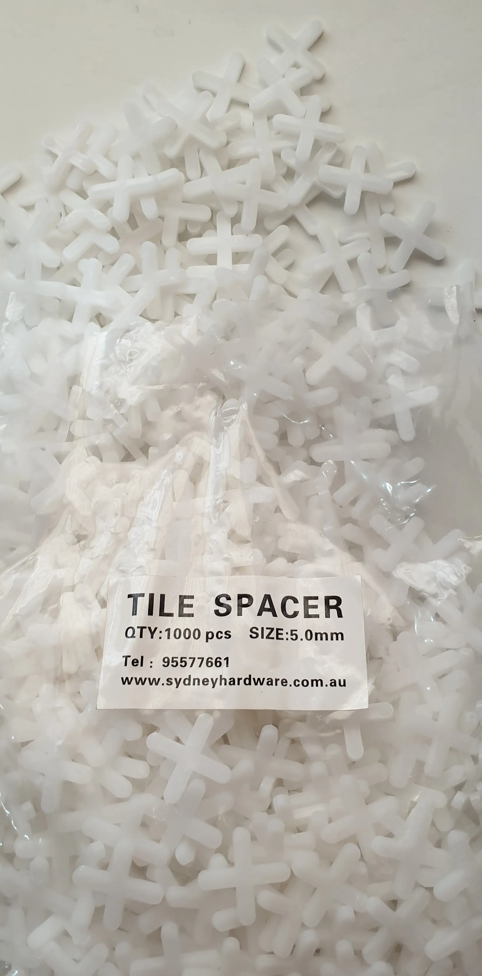 TILE SPACERS CROSSES FOR TILING AND WEDGES